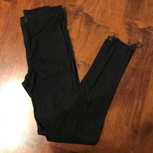 3/$25 Black skinny jeans with released hem